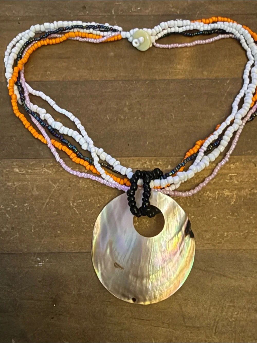 Multi strand seed bead mother of pearl shell pendant necklace